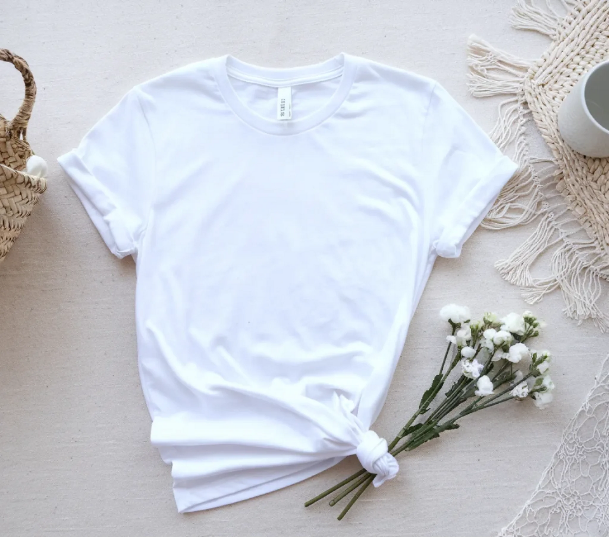 a-flat-lay-of-a-white-t-shirt-placed-on-_F4MmJmAaSd-vgwcSwhmHgg_EeNDaviUQ7ap9eVrPTqsKg